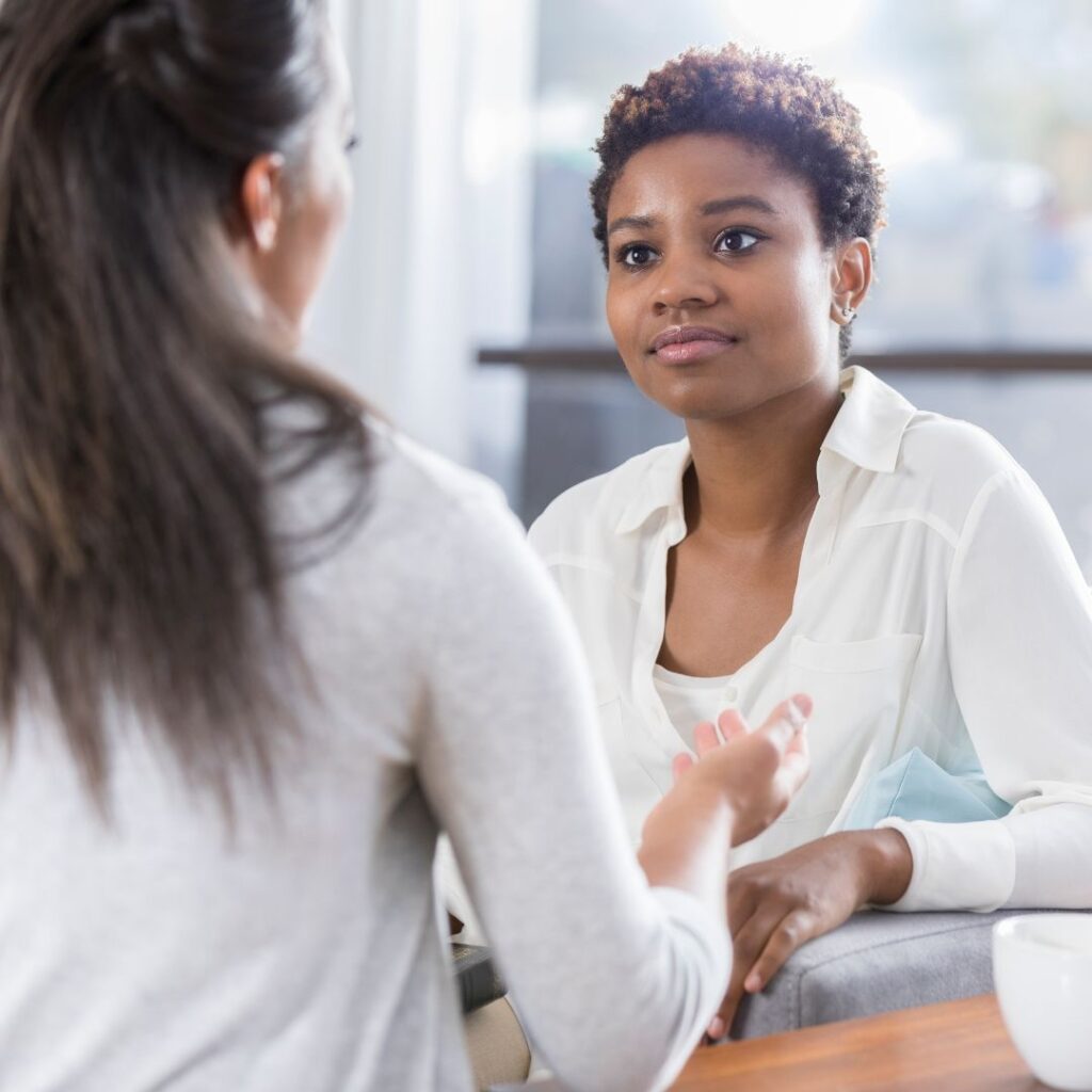 Woman talking to mental health professional