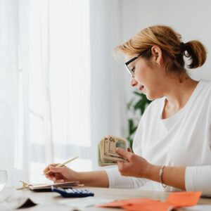 Woman calculating finances