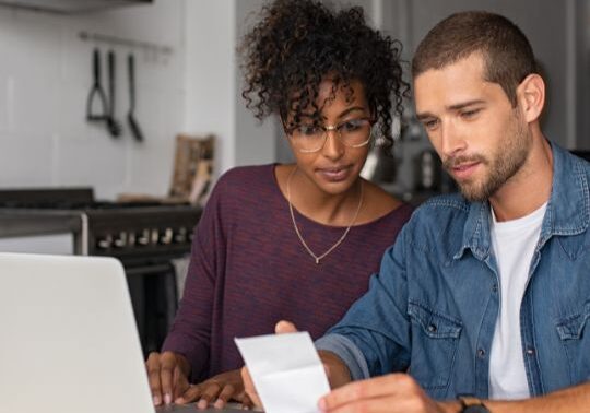 Couple managing finances