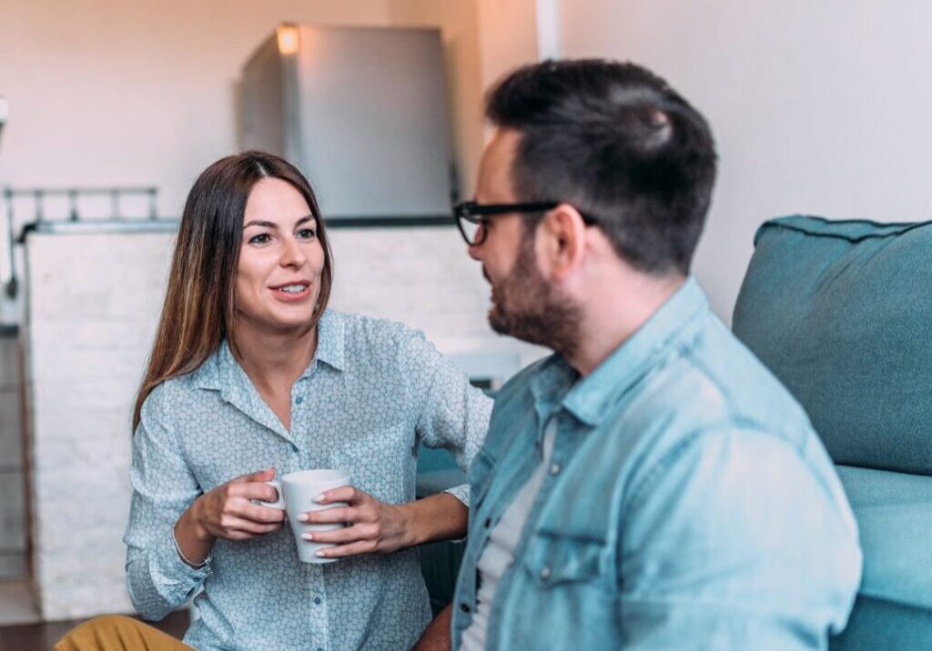 Couple sitting down talking